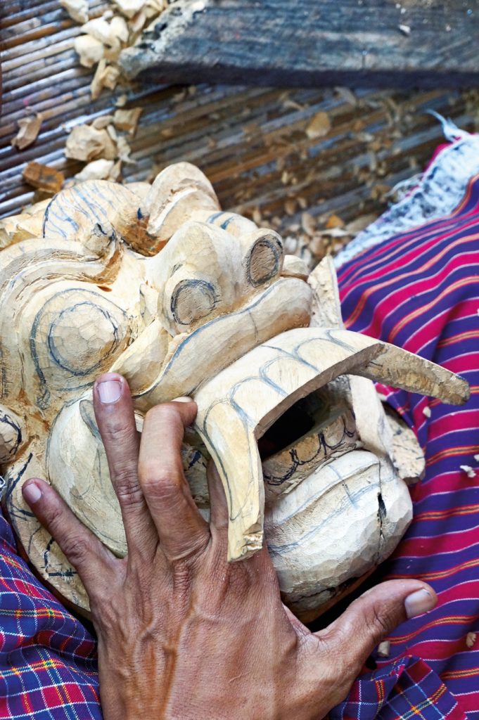 A Mas Wood Carver Crafting a Barong Mask