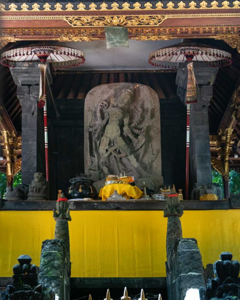 a statue of Durga enshrined inside the temple