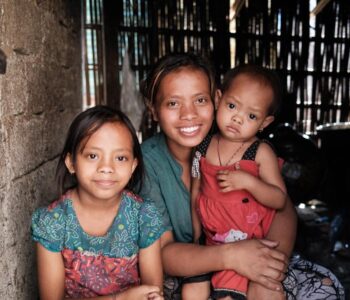 charities-in-bali-East-Bali-Poverty-2--Happy-young-Mum-after-her-baby-is-free-from-malnutrition